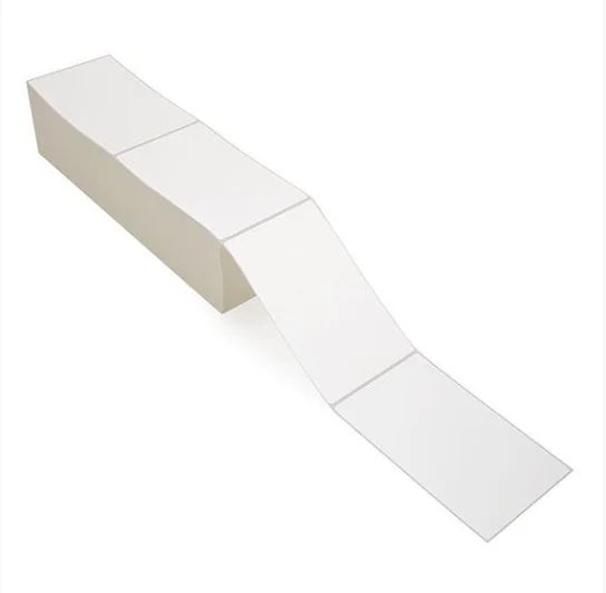 Fanfold stack of blank thermal transfer labels ready for printing